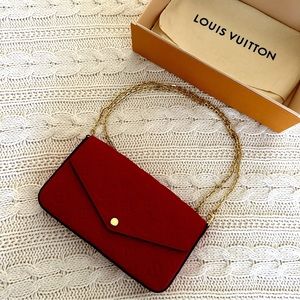 Exquisite Louis Vuitton Monogram Empreinte Felicia Pochette in Scarlet